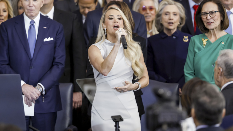 Carrie Underwood wearing gray dress performing at the second Inauguration of President Trump