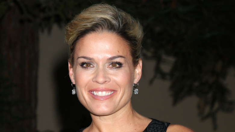 Cat Cora with hair tied back