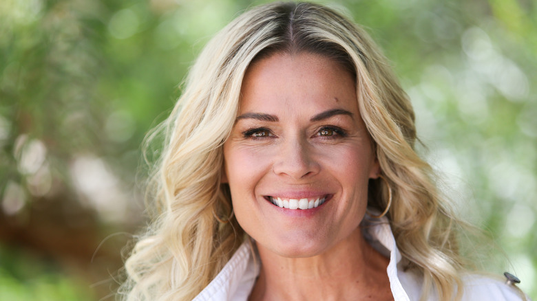 Cat Cora standing outdoors