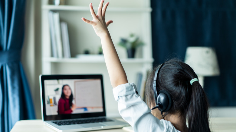 Kid doing virtual learning