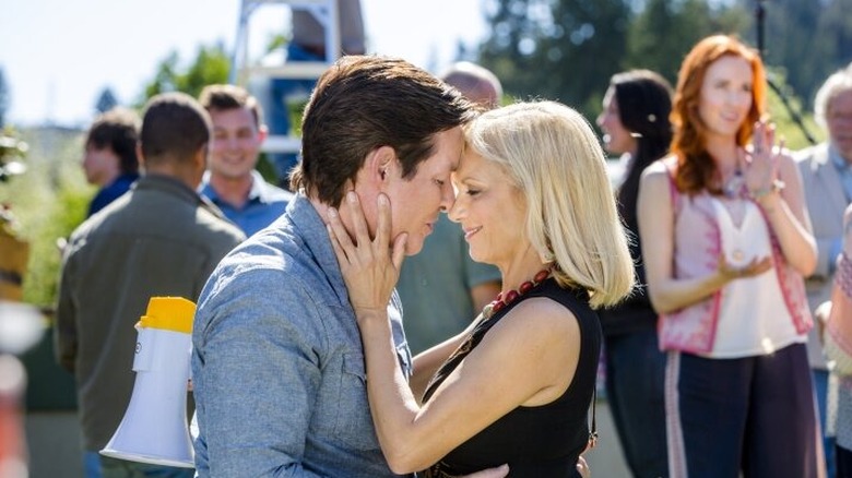 Couple embracing in scene from Cedar Cove