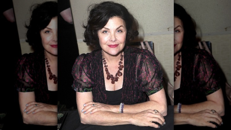 Sherilyn Fenn poses for a photo