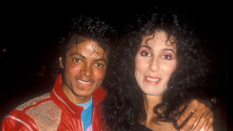 Michael Jackson and Cher smiling