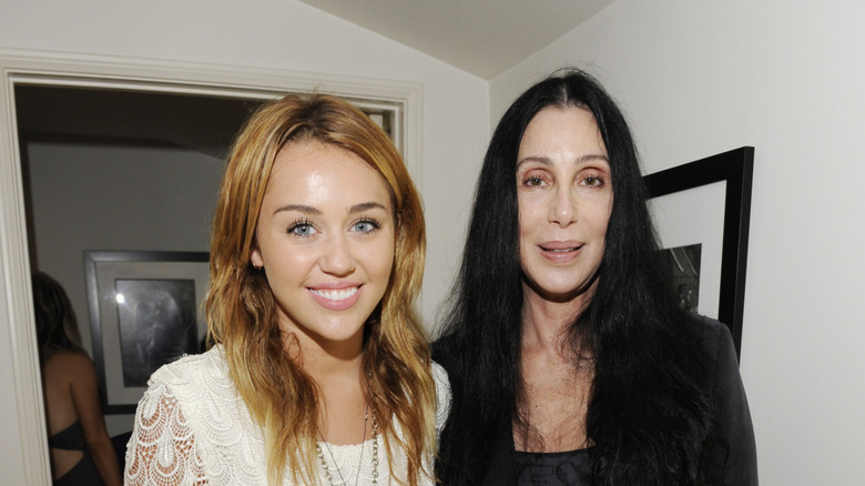 Miley Cyrus and Cher smiling