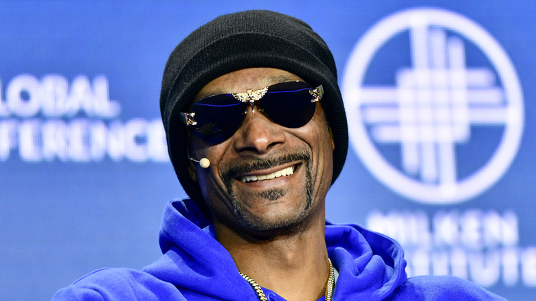 Snoop Dogg in sunglasses smiling