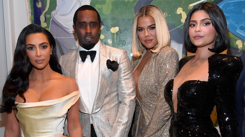 Kim Kardashian West, Sean Combs, Khloe Kardashian, and Kylie Jenner posing