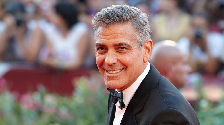 George Clooney smiling outside