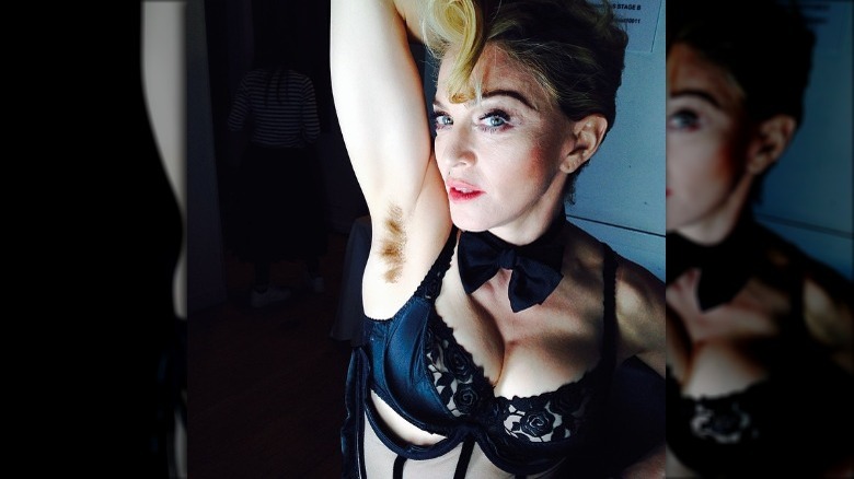 Madonna showing underarm boby hair