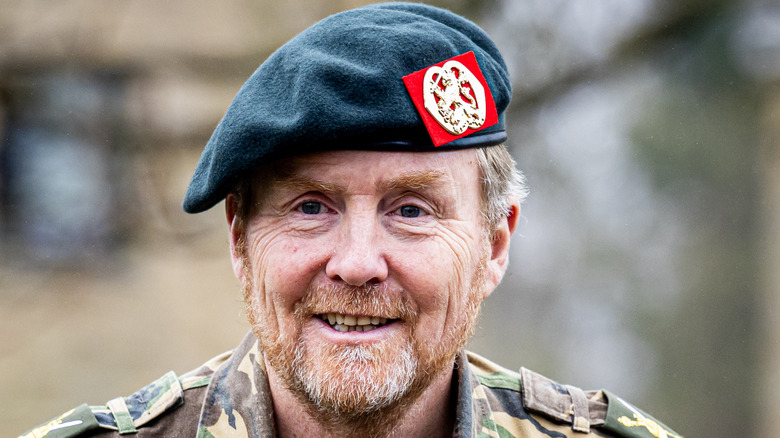 King Willem-Alexander smiling in uniform