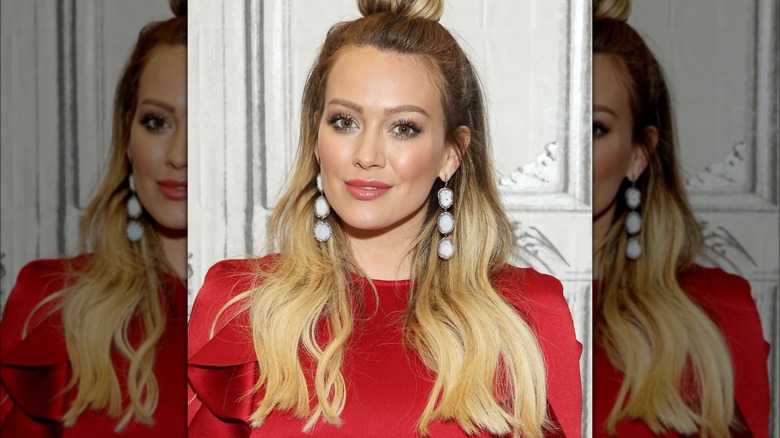 Hilary Duff smiling at event