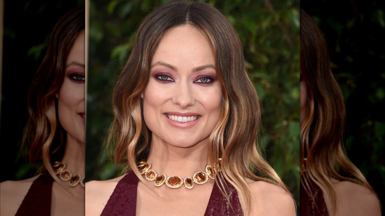 Olivia Wilde smiling at event