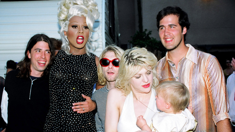 RuPaul, Nirvana, Courtney Love holding Frances Bean Cobain