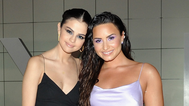 Selena Gomez, Demi Lovato smiling