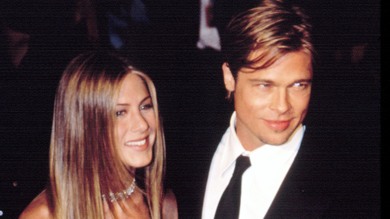 Jennifer Aniston and Brad Pitt smiling