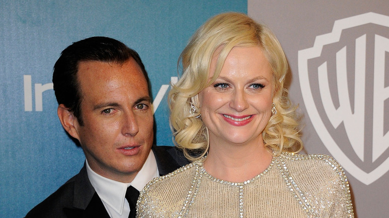 Will Arnett hides behind Amy Poehler