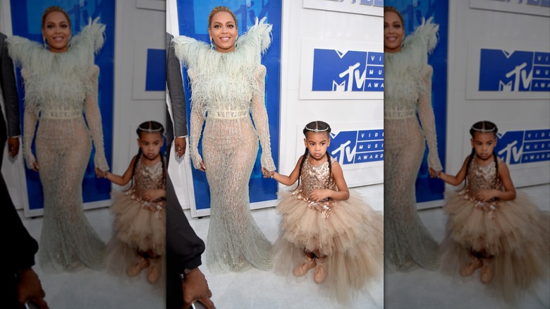 Beyoncé smiling with her daughter, Blue Ivy Carter, at the 2016 MTV VMAs.