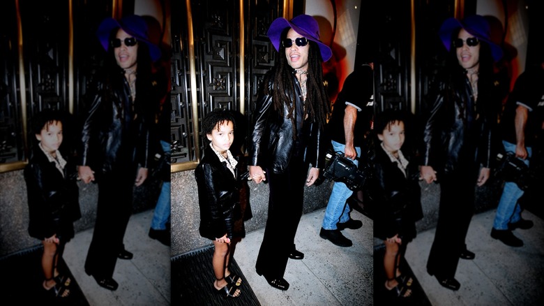 Lenny Kravitz walking with Zoe Kravitz at the 1997 MTV Awards