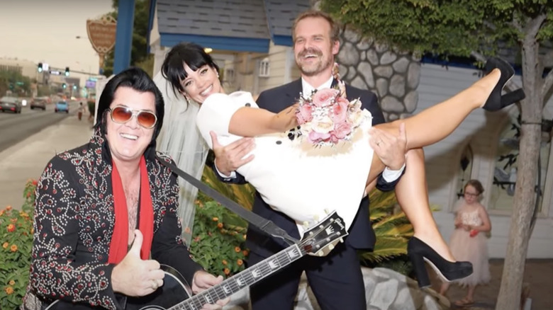 David Harbour holding up Lily Allen 