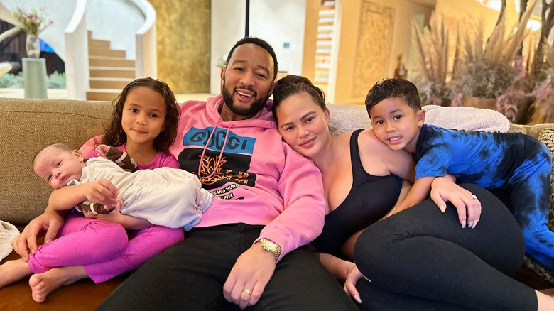 John Legend and Chrissy Teigen with their kids