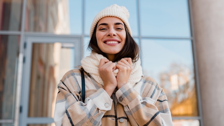 A smiling woman in winter