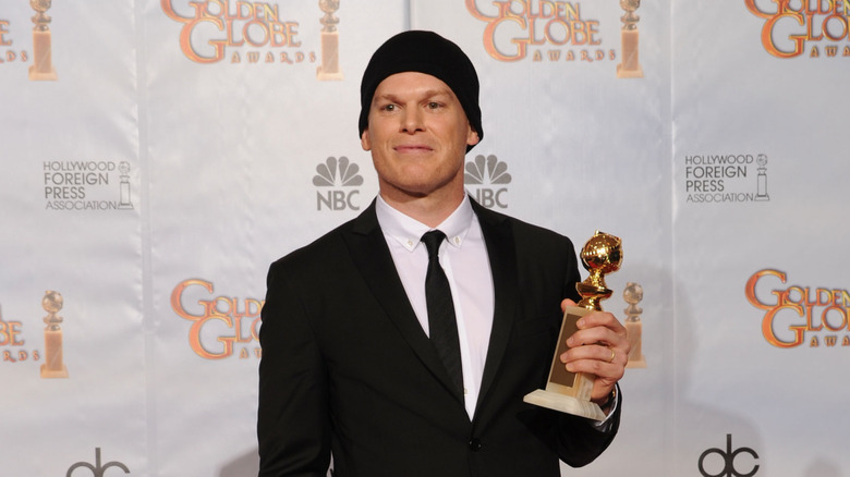 Michael C. Hall holding a Golden Globe award