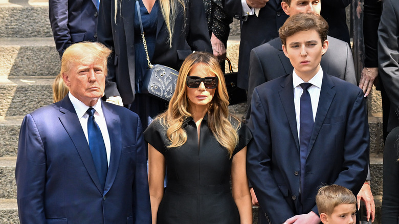 The Trumps next to Barron