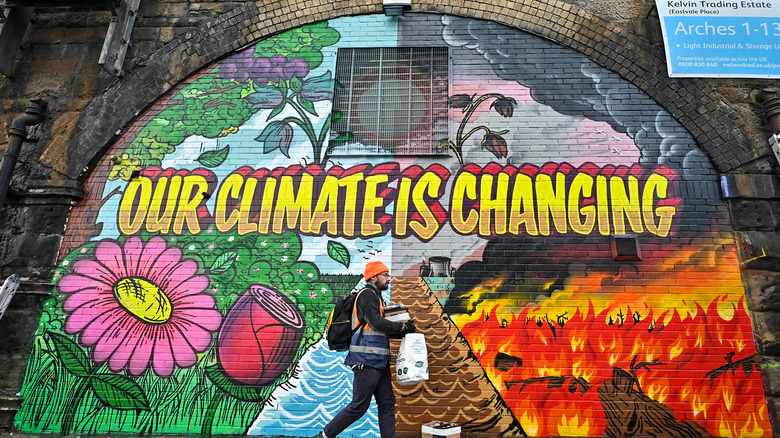 graffiti stating our climate is changing