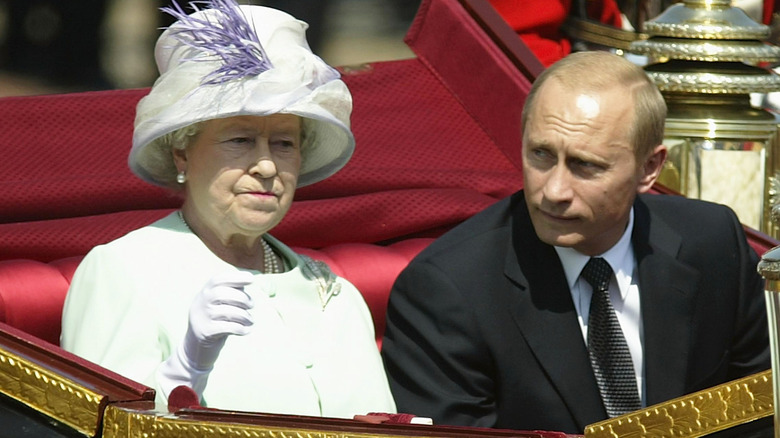 The Queen with Vladimir Putin in an open carriage