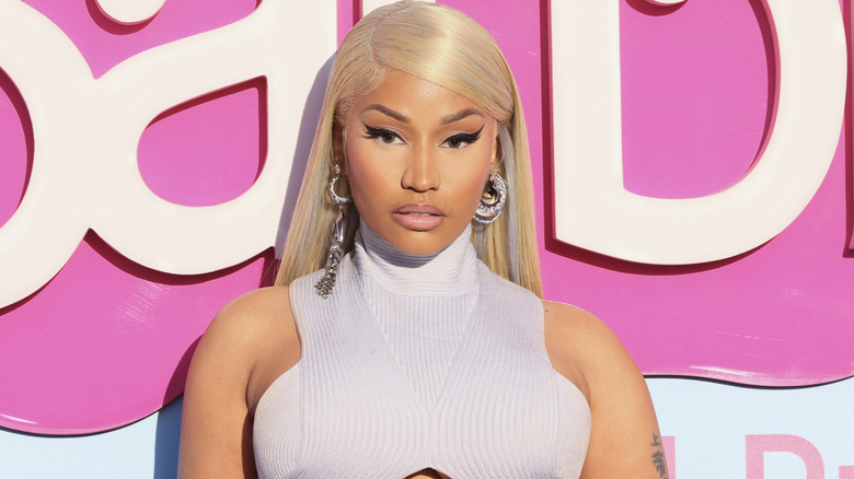 Nicki Minaj posing with blonde hair and serious scowl