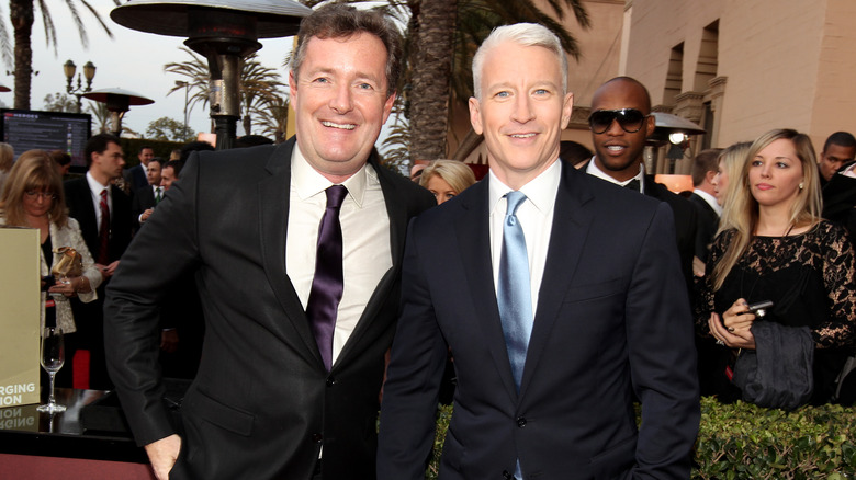 Piers Morgan and Anderson Cooper at a CNN event in 2011