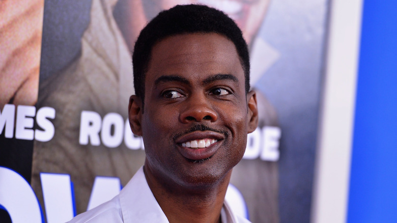 Chris Rock posing at an event