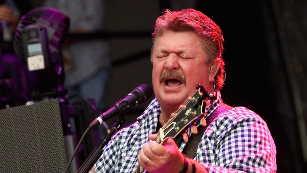 Joe Diffie singing and playing guitar in 2016