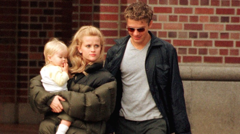 Reese Witherspoon and Ryan Phillippe with their kid