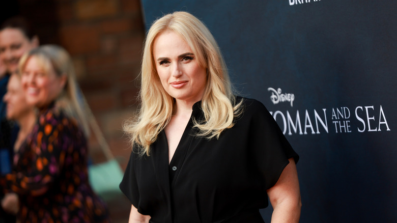 Rebel Wilson in black dress after weight loss 