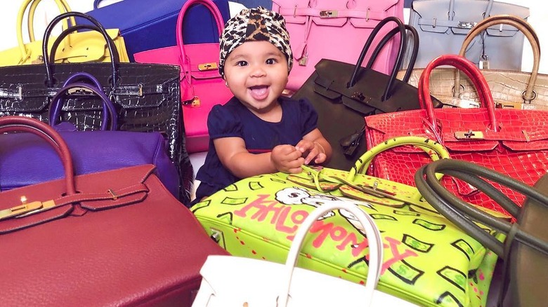 Baby True with Birkin bags