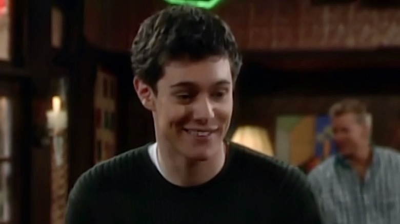 Adam Brody smiling into camera