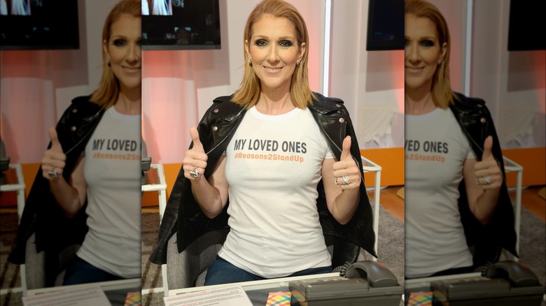 Celine Dion giving a thumbs-up