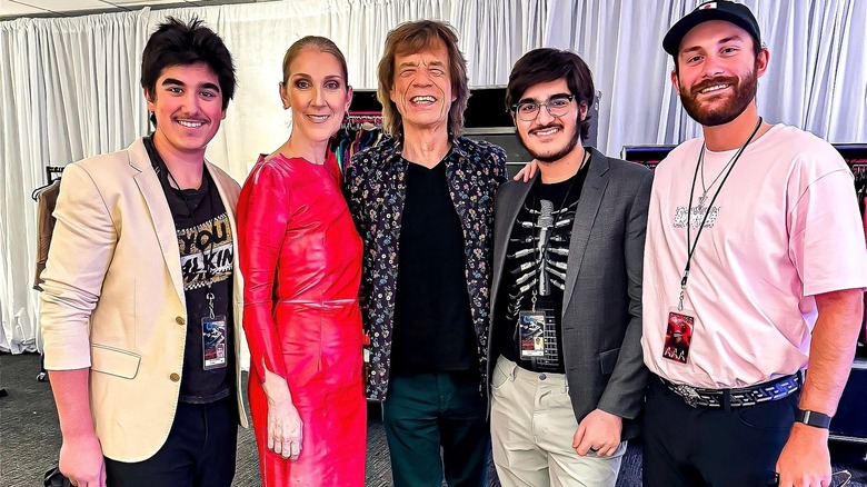 Céline Dion, Mick Jagger, Eddy, Nelson, and René-Charles Angélil smiling