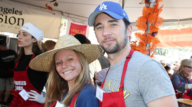 Marci Miller and Billy Flynn pose for a photo. 