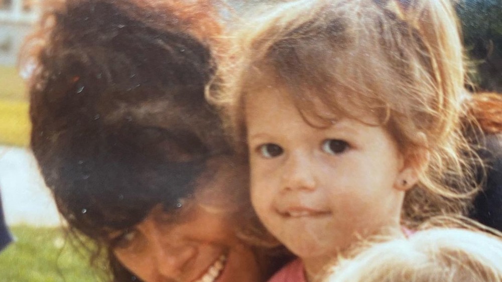 Chanel West Coast as a young girl next to her mother