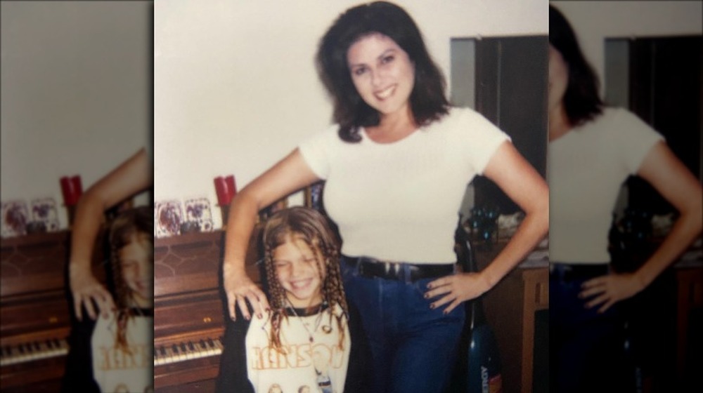 Chanel West Coast with braids next to her mother