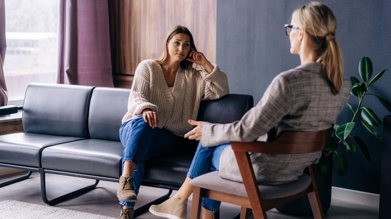 woman talking to therapist