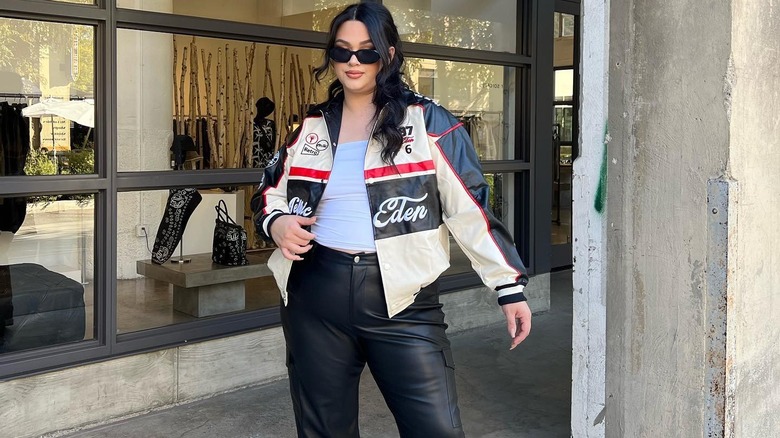 woman posing in motorcycle jacket