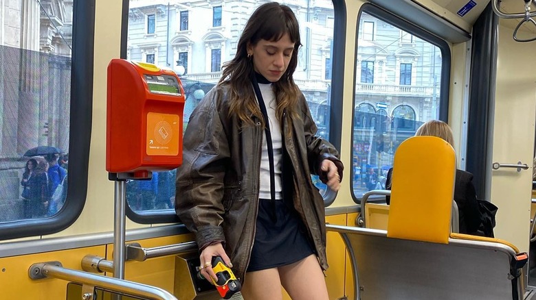 woman standing in subway