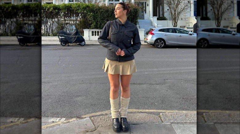 girl in front of townhouses