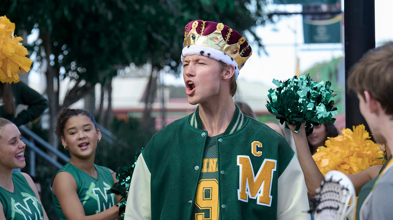 Charles Alexander as Kirin wearing a crown in "The Wilds"