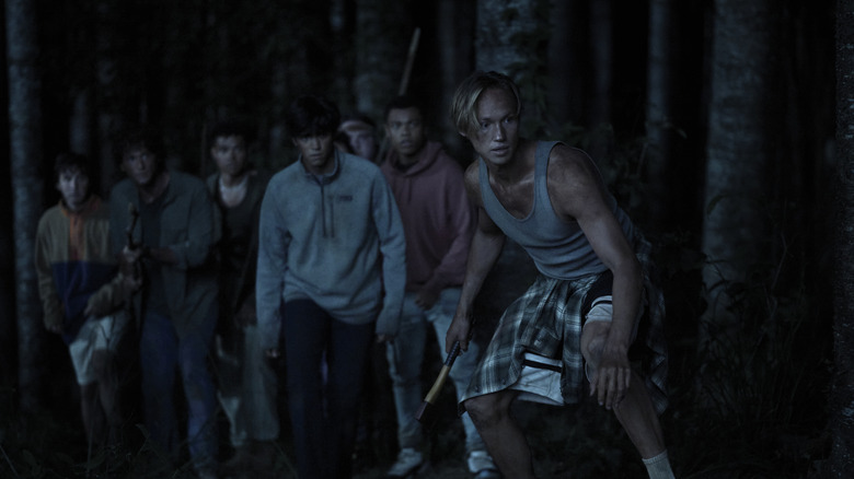 Charles Alexander leading a pack of boys in "The Wilds"