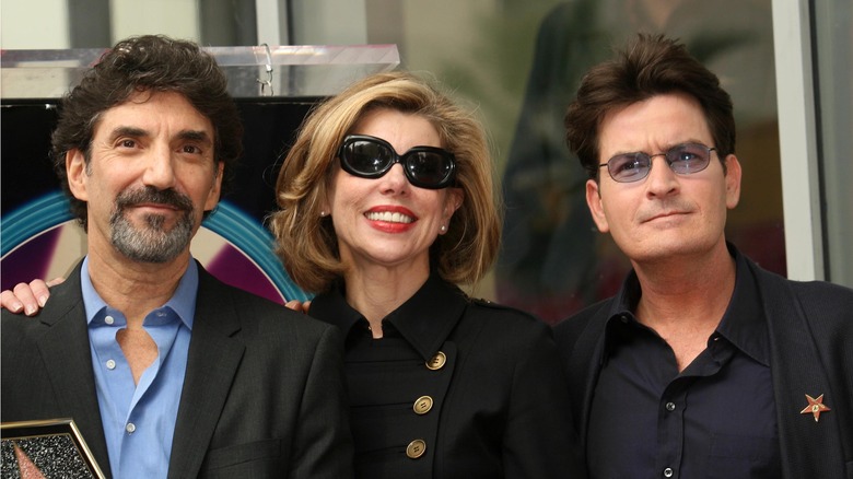 Chuck Lorre, Cristine Baranski, and Charlie Sheen pose together
