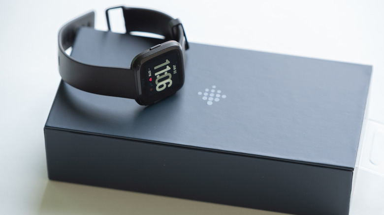 Fitbit Versa 3 watch on black box