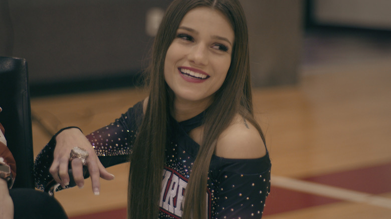 Morgan Simianer smiling in her cheer uniform 